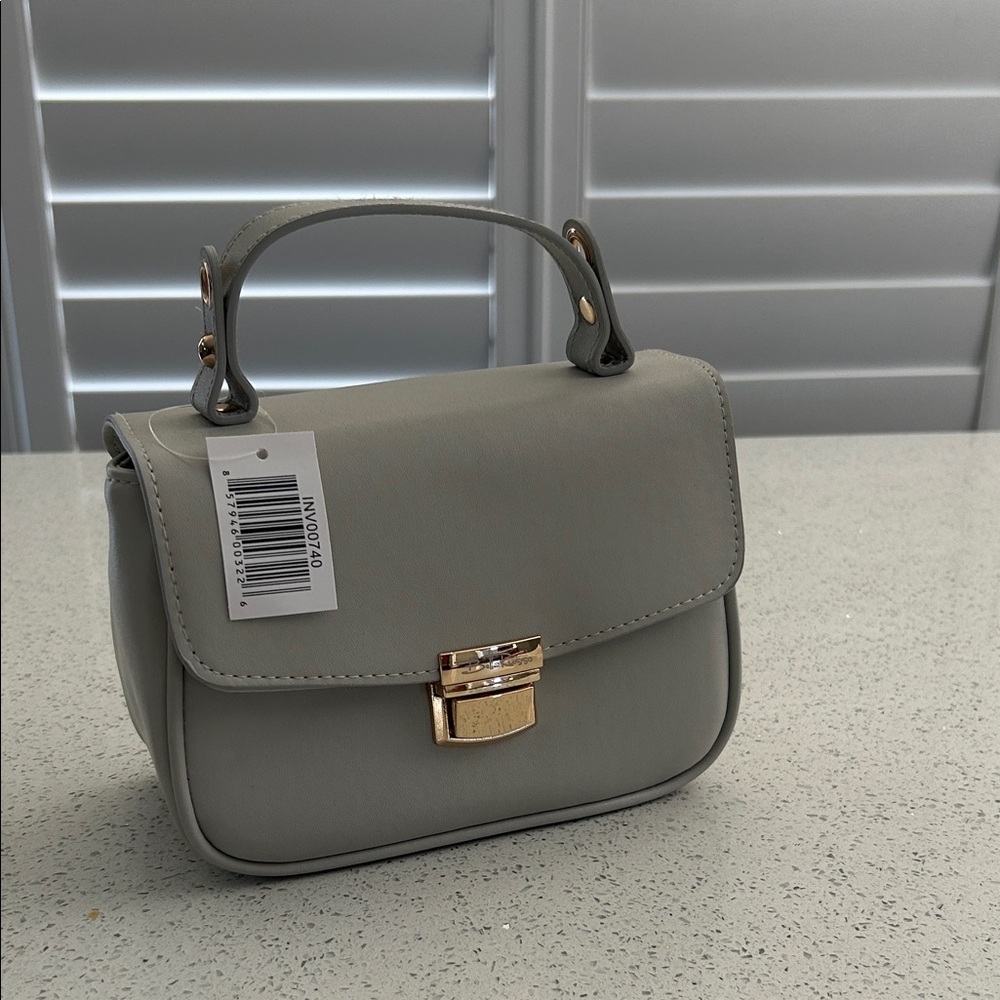 NWT Elegant Gray mini Handbag with Gold Straps